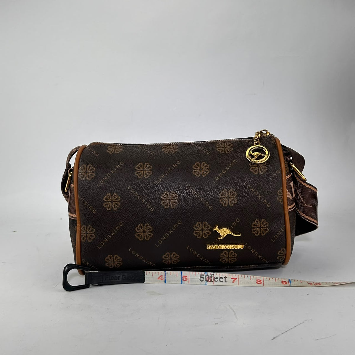 Badidaishu Brown Clover Print Barrel Bag