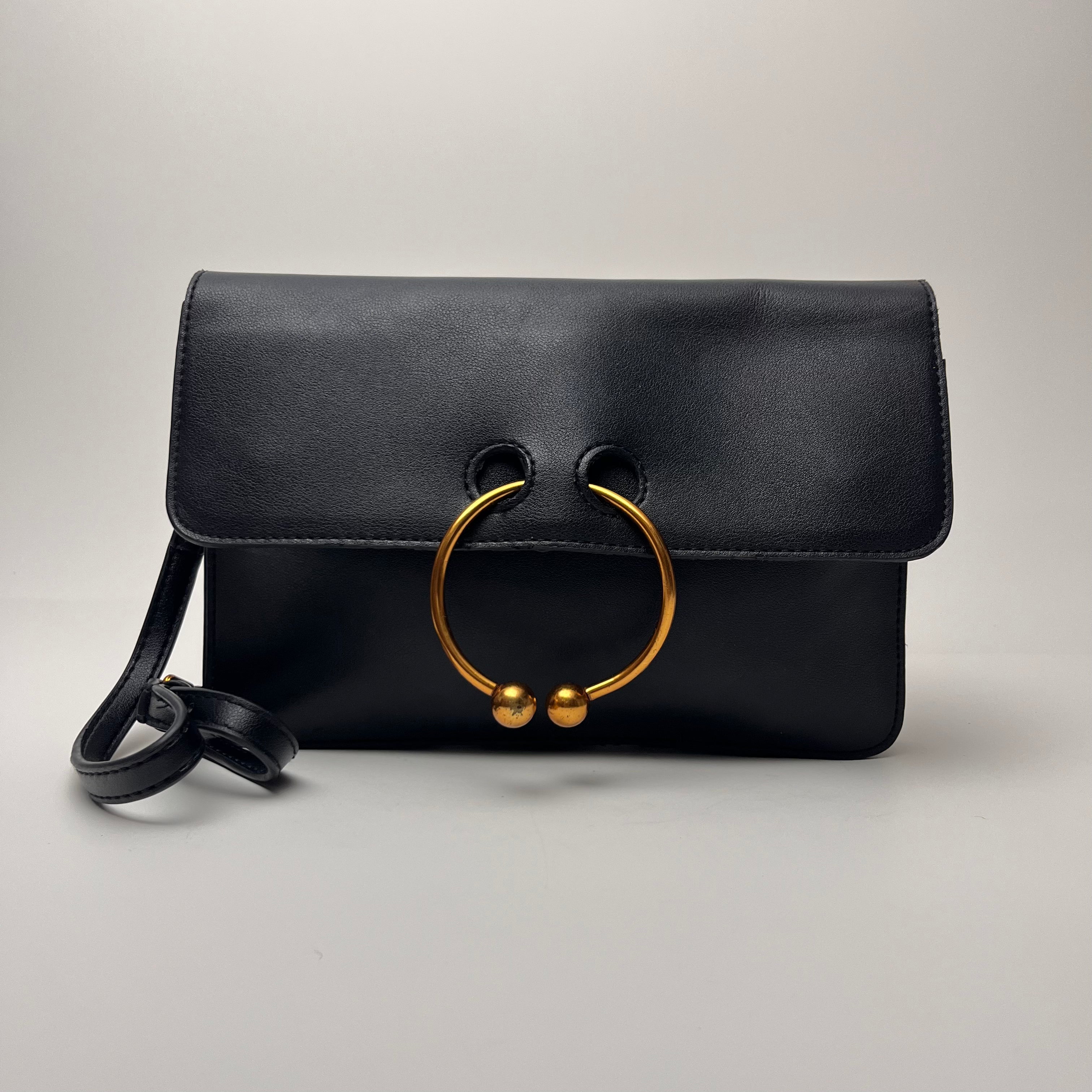 Pierce Ring Clutch Crossbody