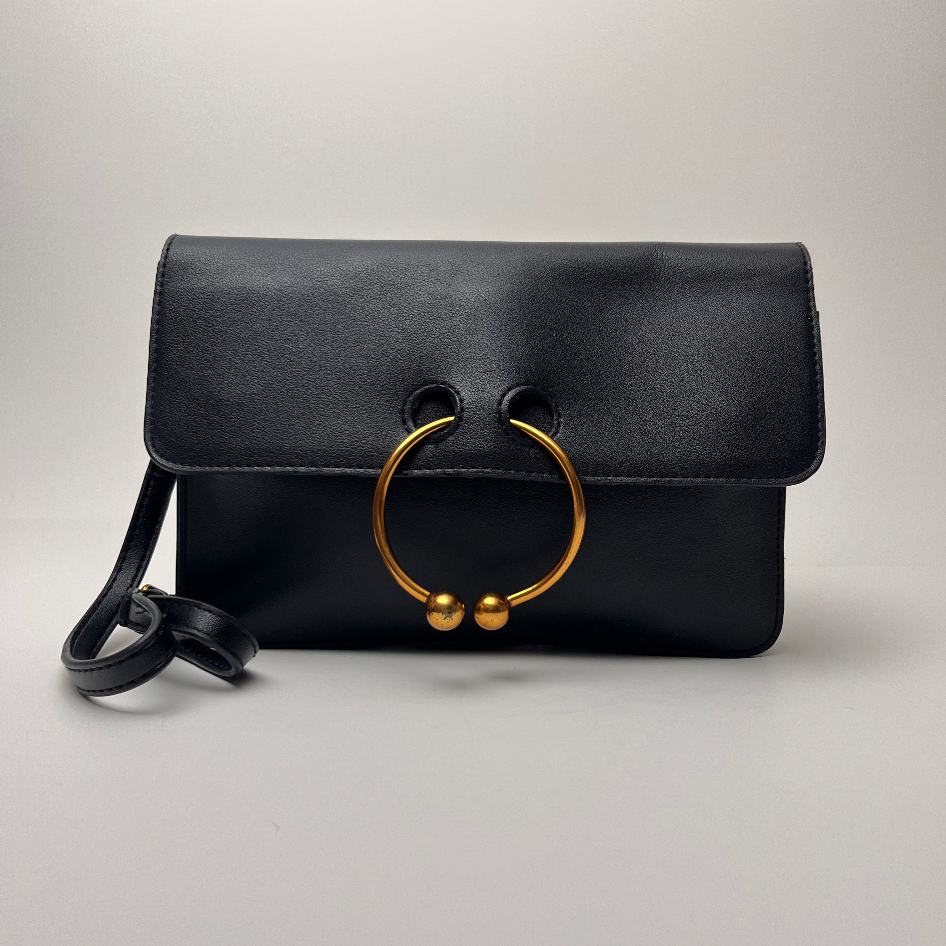 Pierce Ring Clutch Crossbody