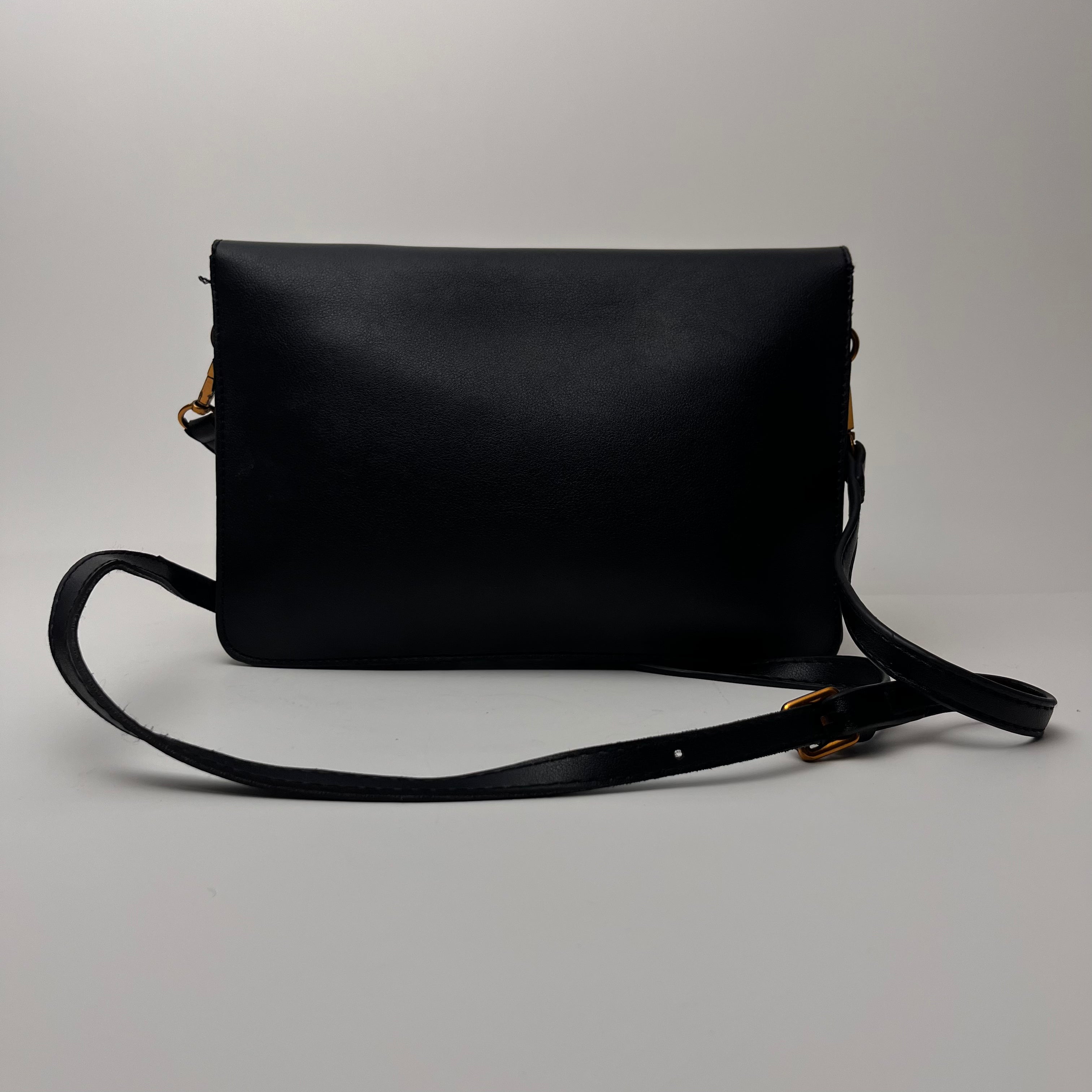 Pierce Ring Clutch Crossbody