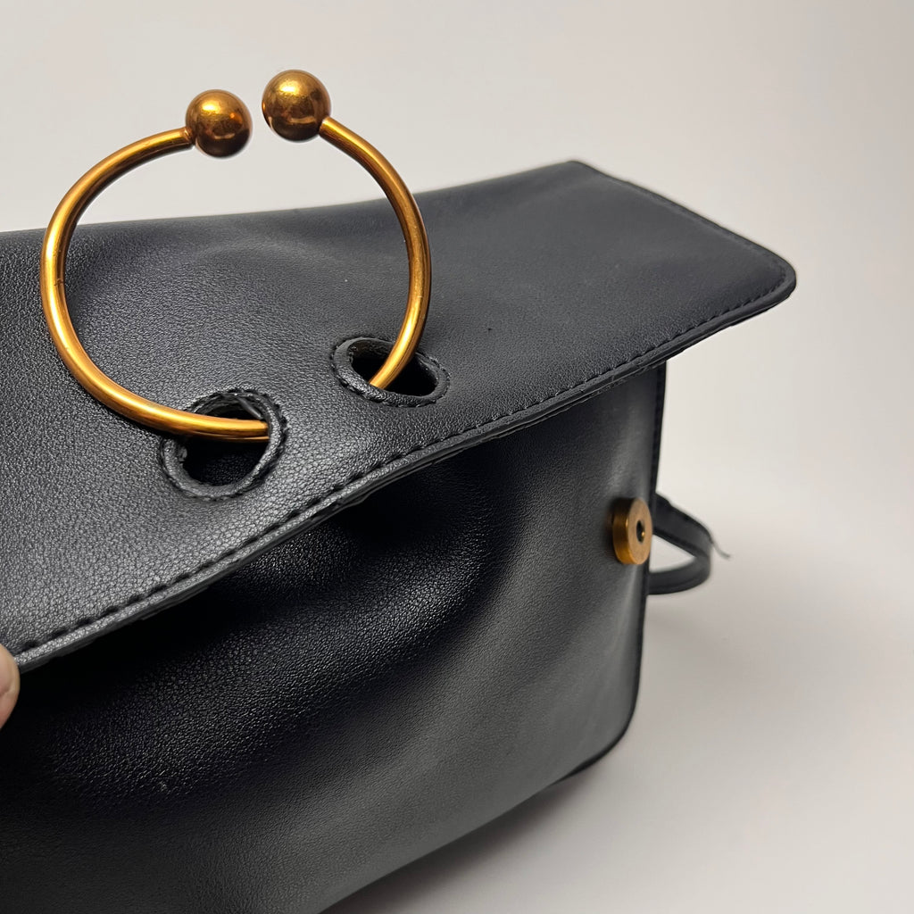 Pierce Ring Clutch Crossbody